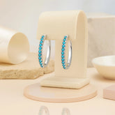 Sterling Silver Hoop Earrings with Turquoise Blue Gemstones