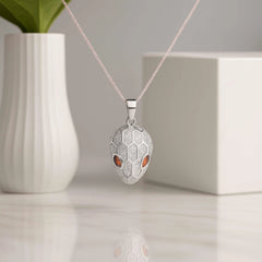 925 Sterling Silver Snake Head Pendant Necklace | Rhodium Plated with Cubic Zirconia & Orange Eye Detail
