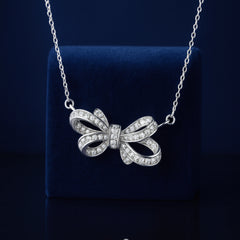 925 Sterling Silver Rhodium Plated CZ Bow Pendant Necklace